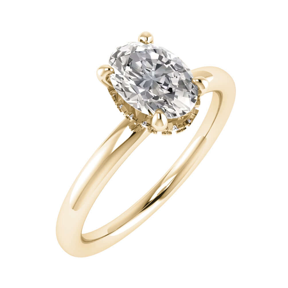 front on image of luxury oval yellow gold hidden halo lab grown diamond engagement ring
