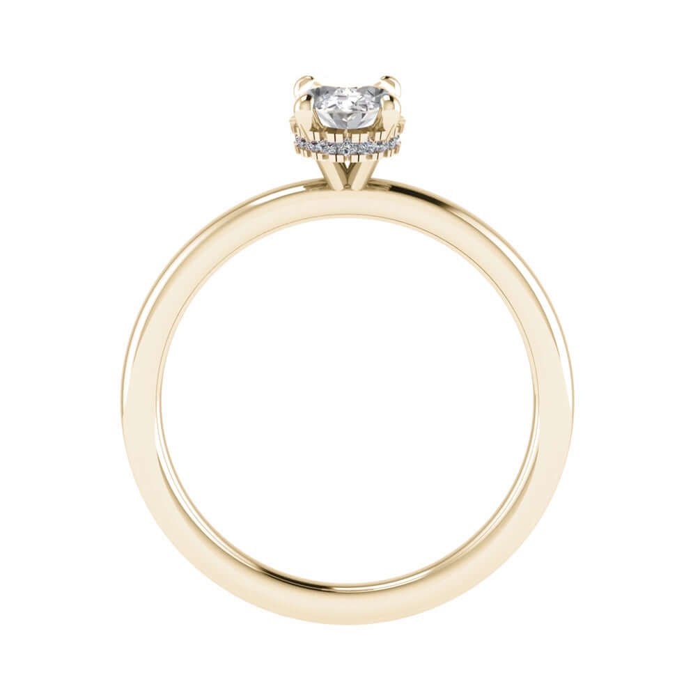side image of luxury oval yellow gold hidden halo lab grown diamond engagement ring