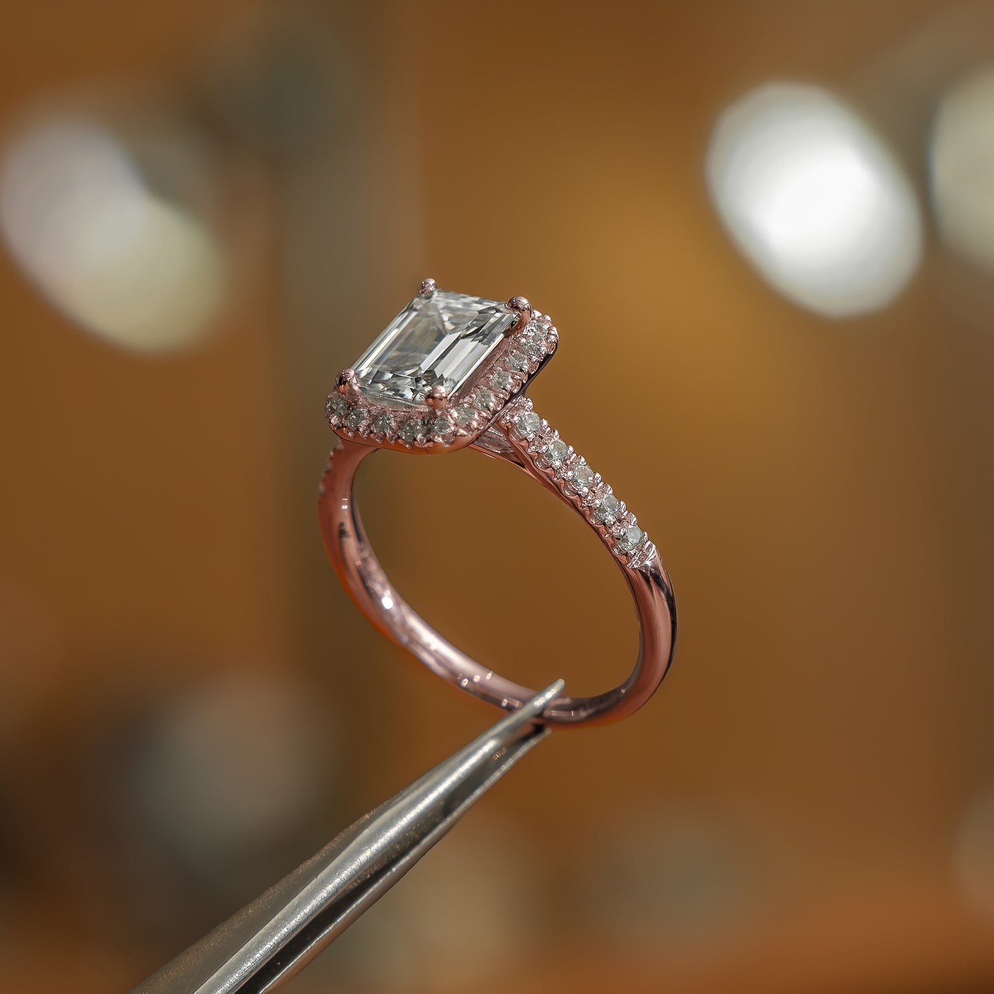 side shot of emerald luxury rose gold halo lab grown diamond engagement ring