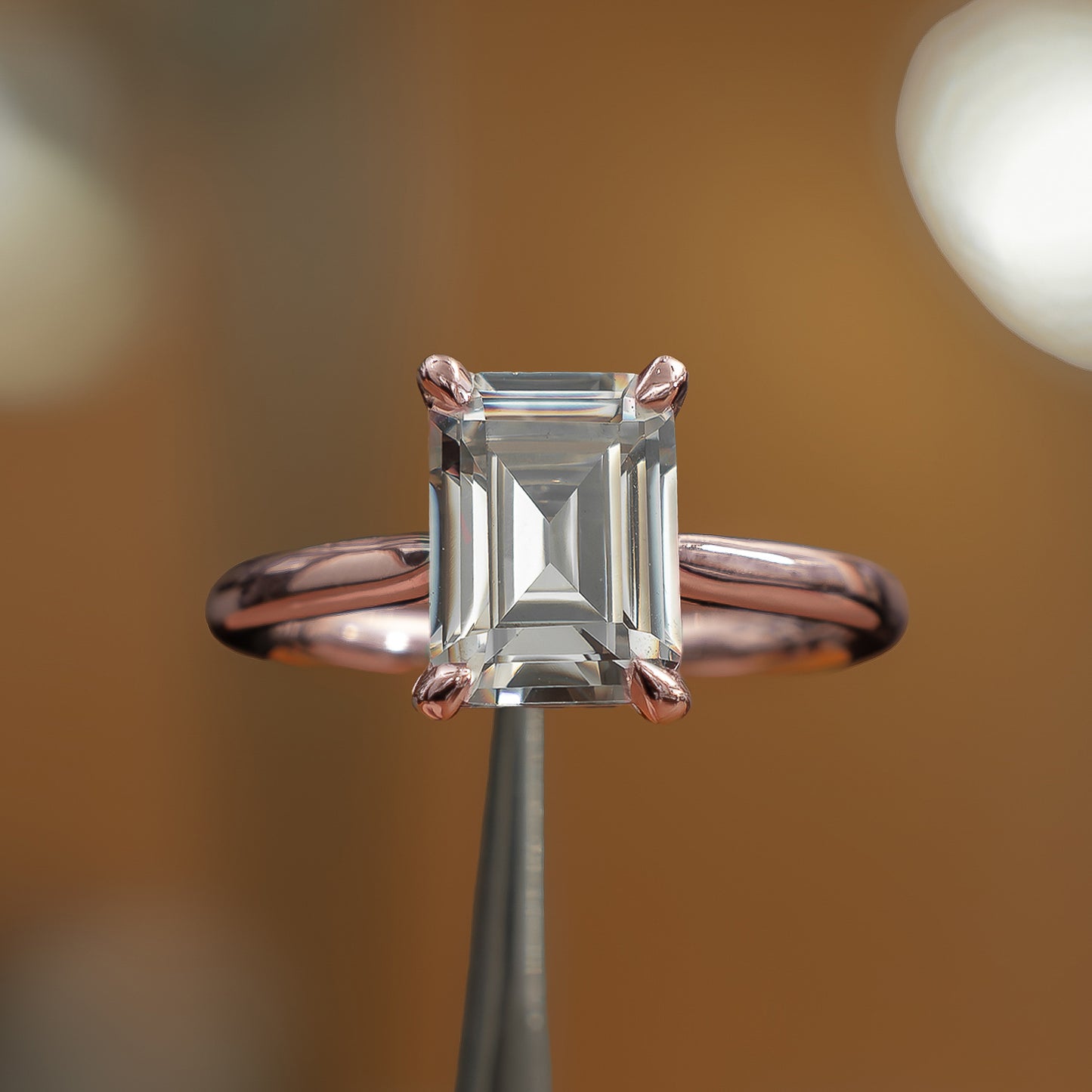 frontal view of luxury emerald rose gold solitaire lab grown diamond engagement ring