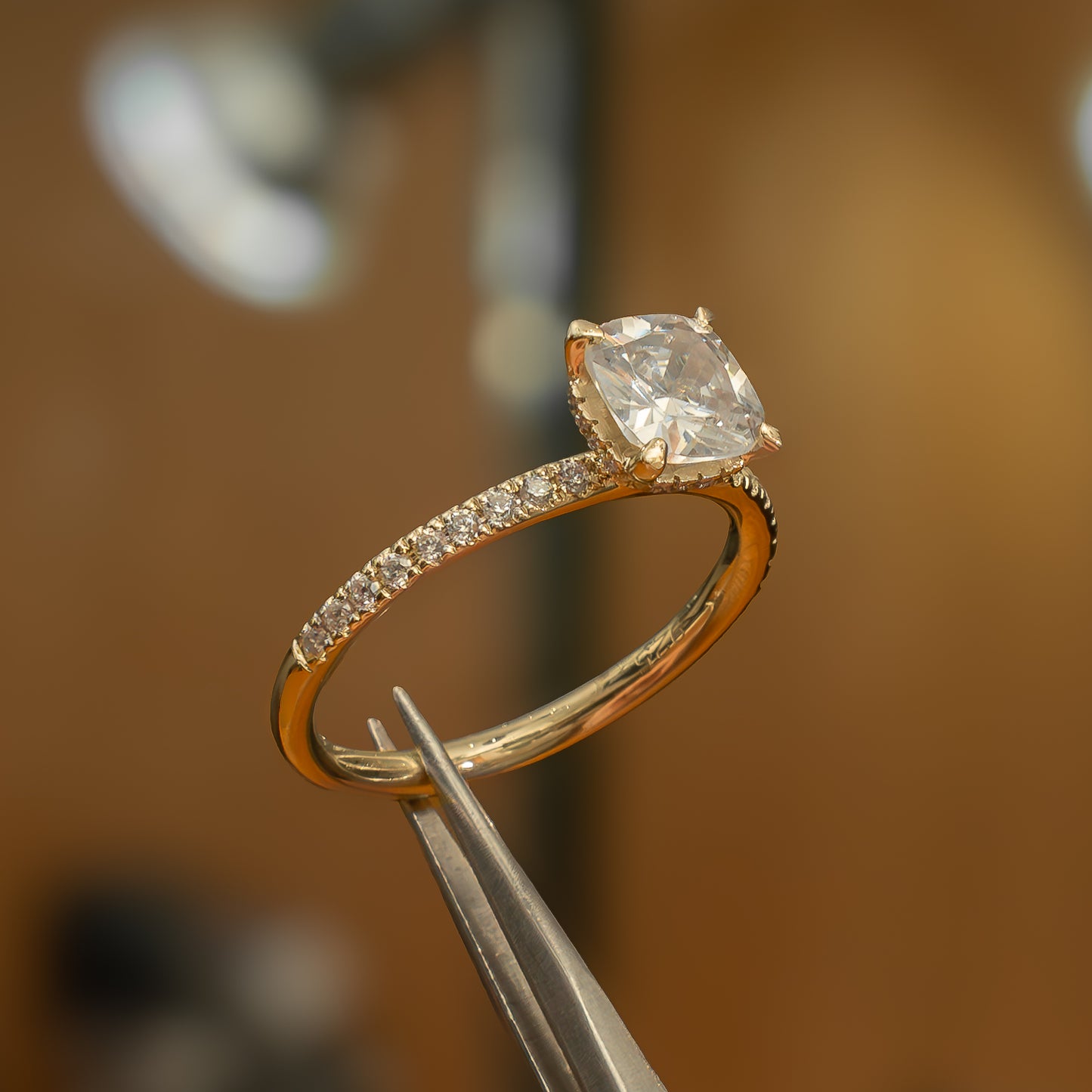 left side view luxury cushion yellow gold diamond set shoulders hidden halo lab grown diamond engagement ring