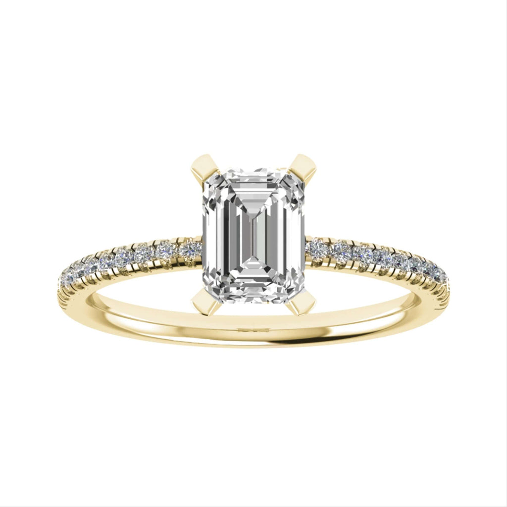 luxury emerald yellow gold diamond set shoulders lab grown diamond engagement ring