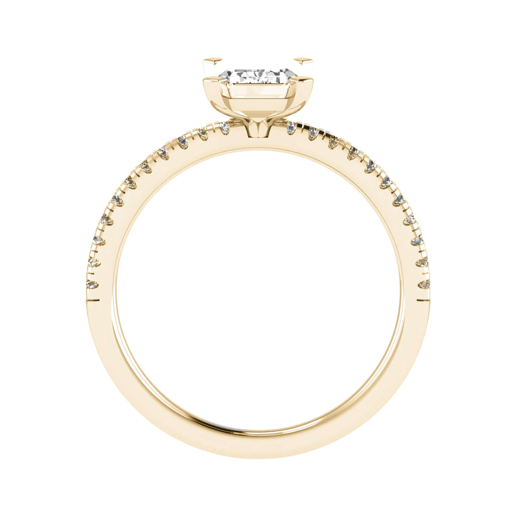 side view of luxury emerald yellow gold diamond set shoulders lab grown diamond engagement ring